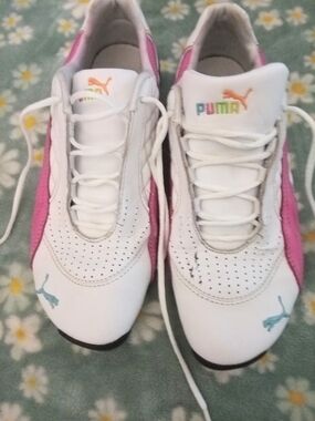 Puma White Sneakers with Black Logo and Text